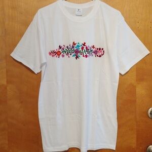 Hand embroidered t-shirt with cotton thread of flowers.